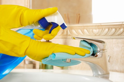 Local Camden cleaning team removing construction dust from a flat